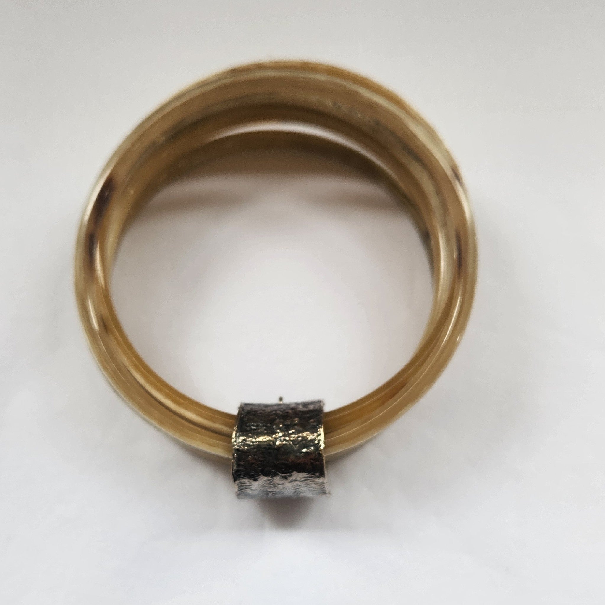 Natural buffalo bangle cluster with silver plated detail