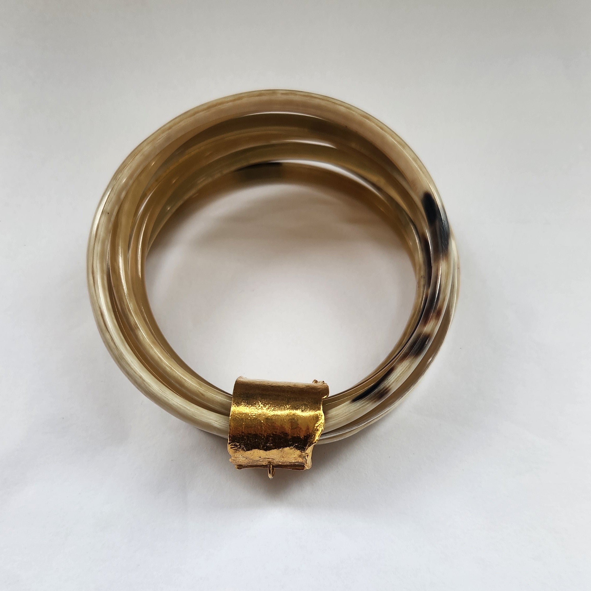 Natural buffalo bangle cluster with gold plated detail