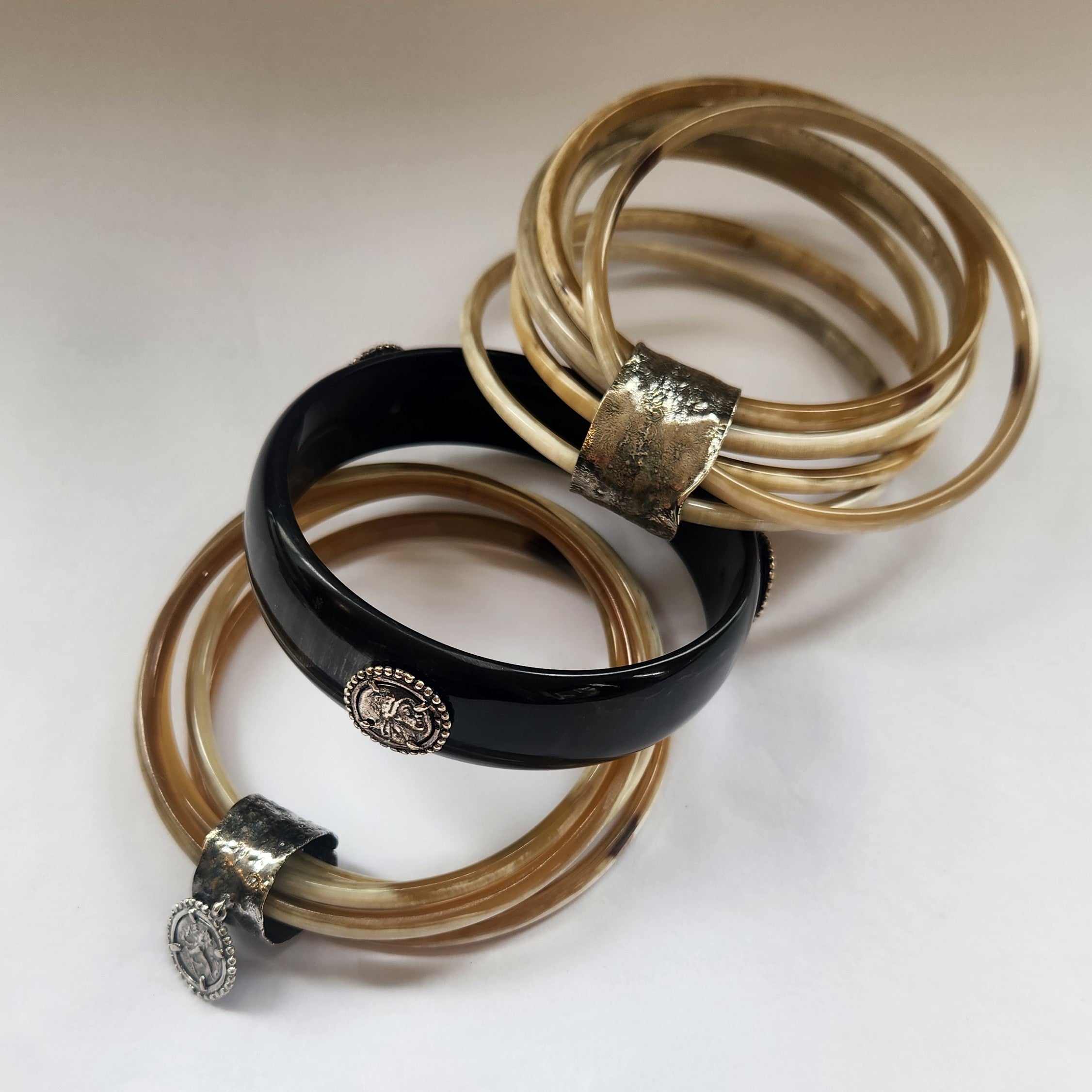 Natural buffalo bangle cluster with silver plated detail
