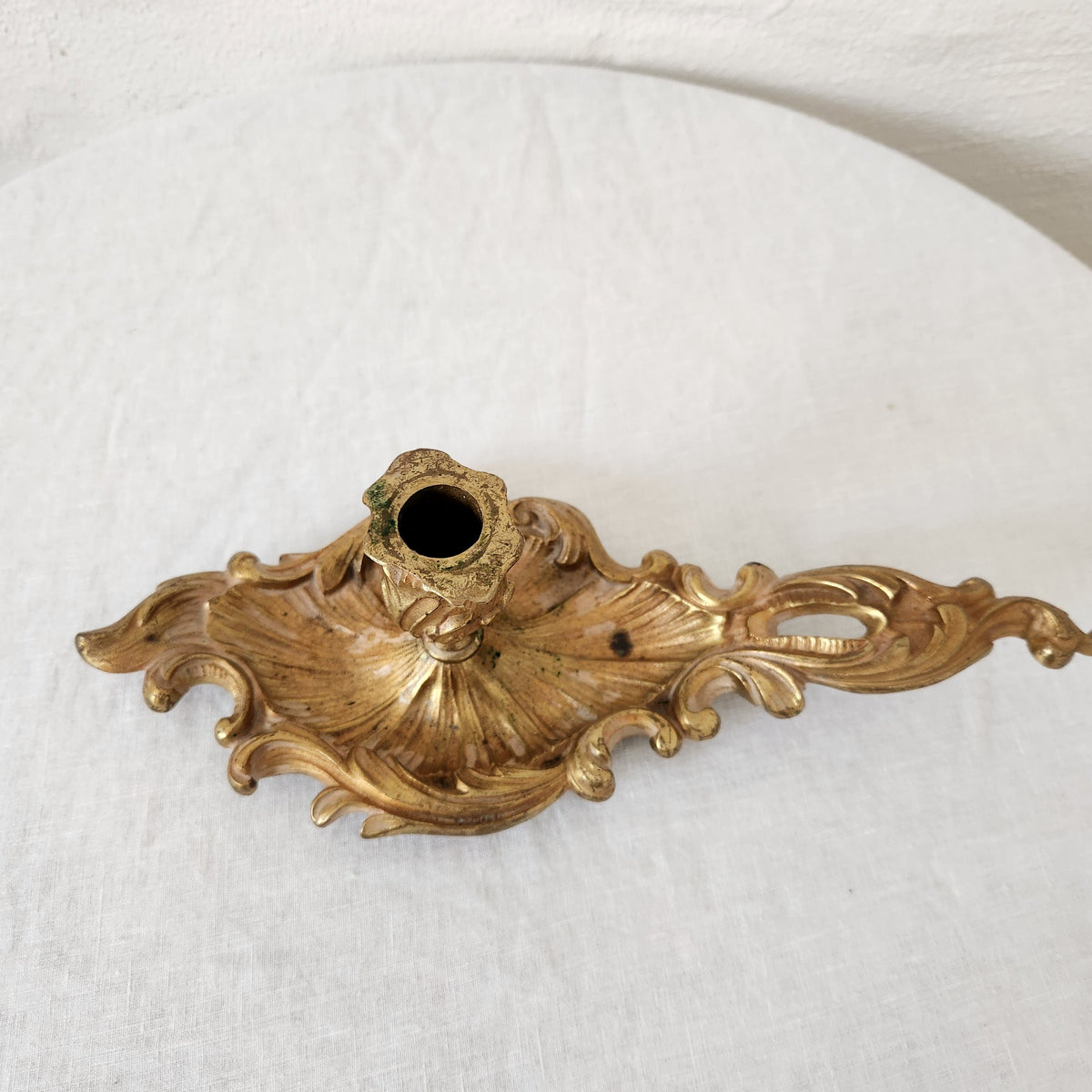 top view of an antique brass chamber candlestick