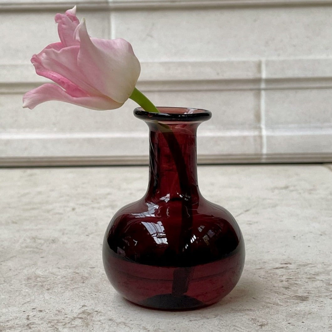 Strawberry coloured glass bud vase