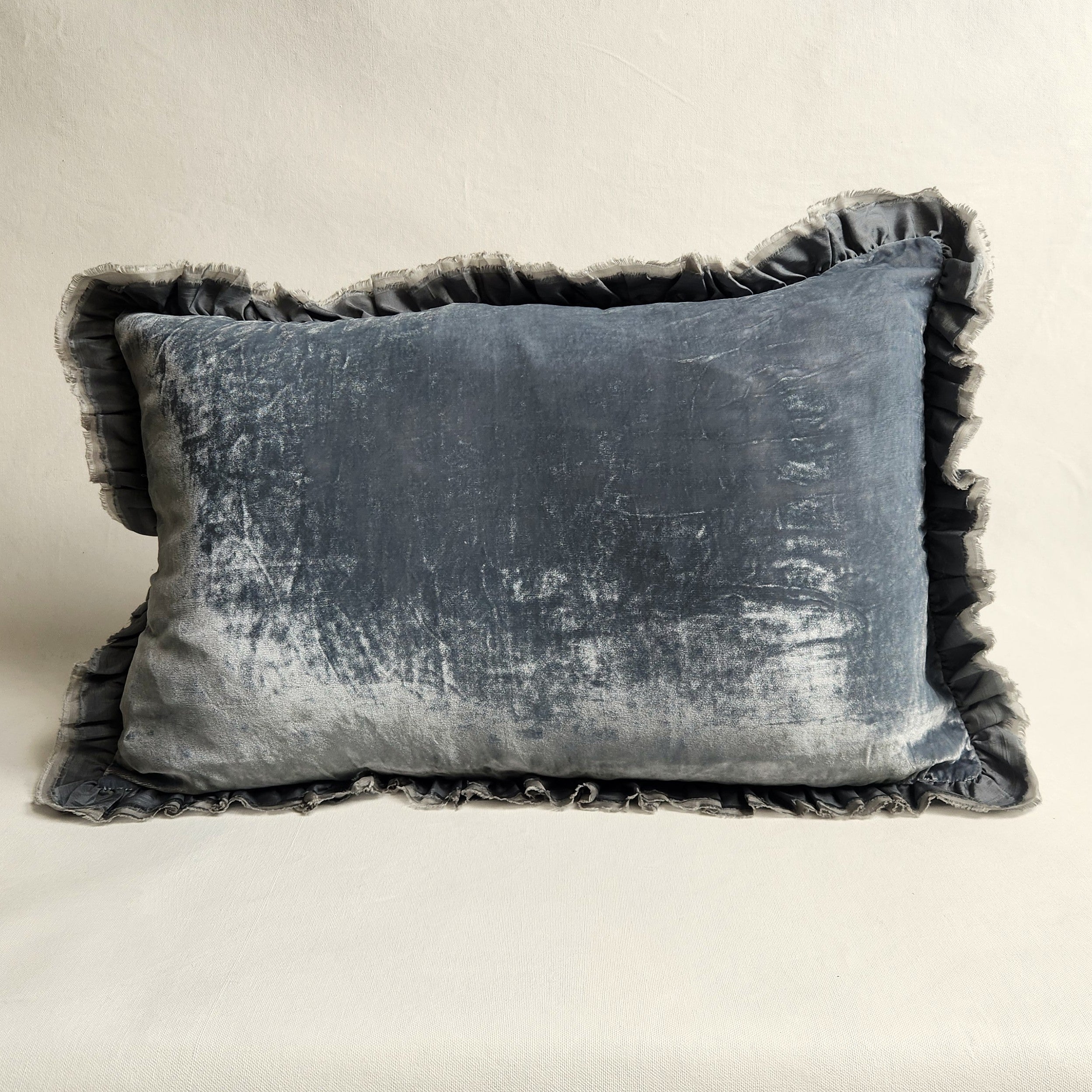 Smoky blue silk velvet rectangular cushion with raw silk ruffle