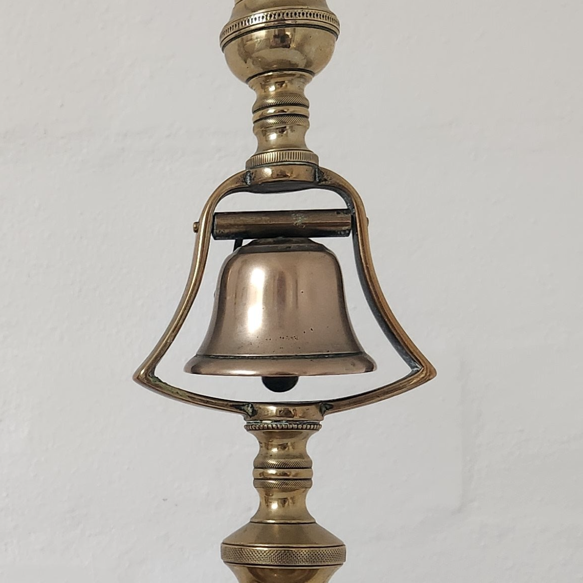 A pair of Early 1800's English Solid Brass Candlesticks with Ringing Bell