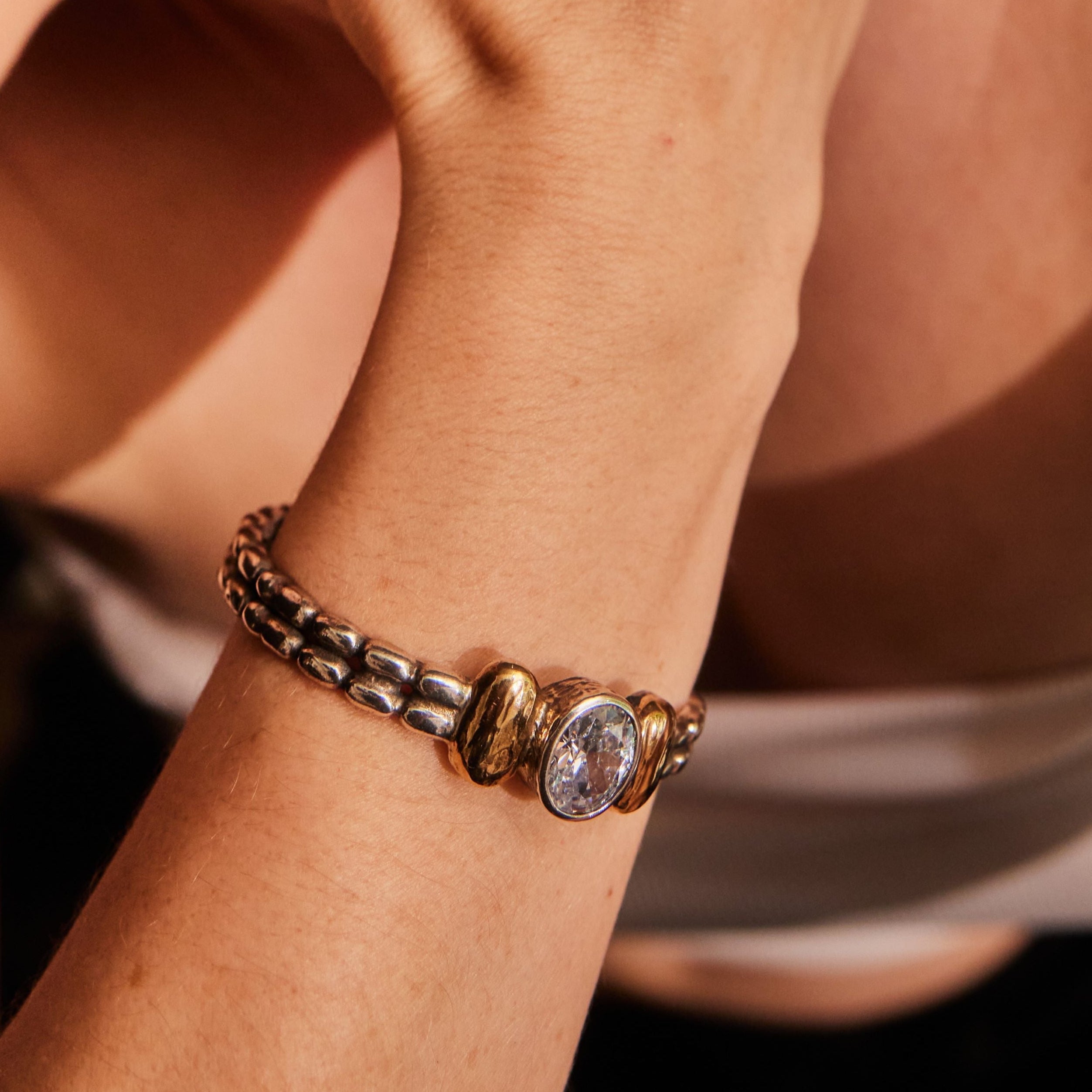 "Celeste" Sterling Silver Cuff with 9 ct gold and Zirconia Centre Stone.