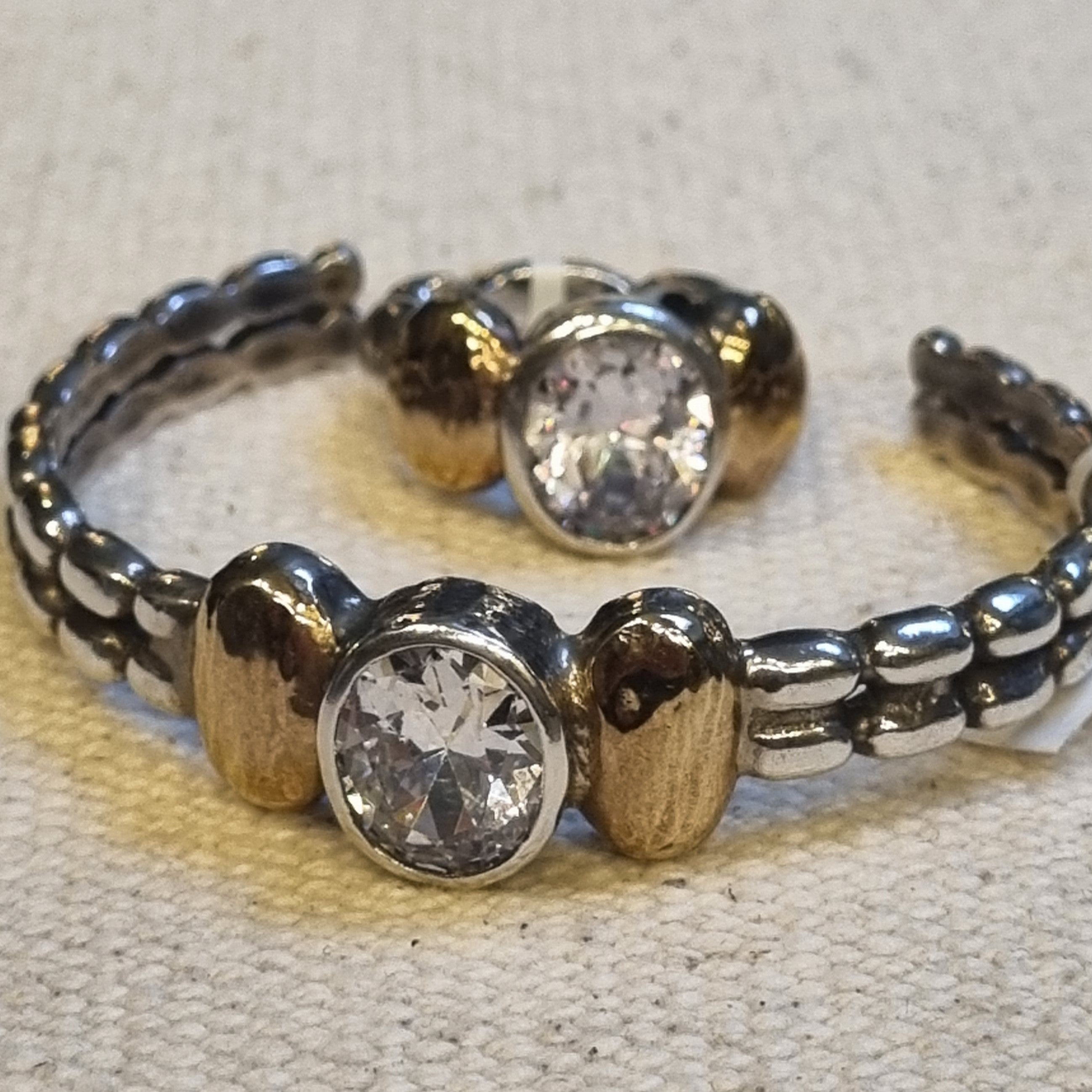 "Celeste" Sterling Silver Cuff with 9 ct gold and Zirconia Centre Stone.
