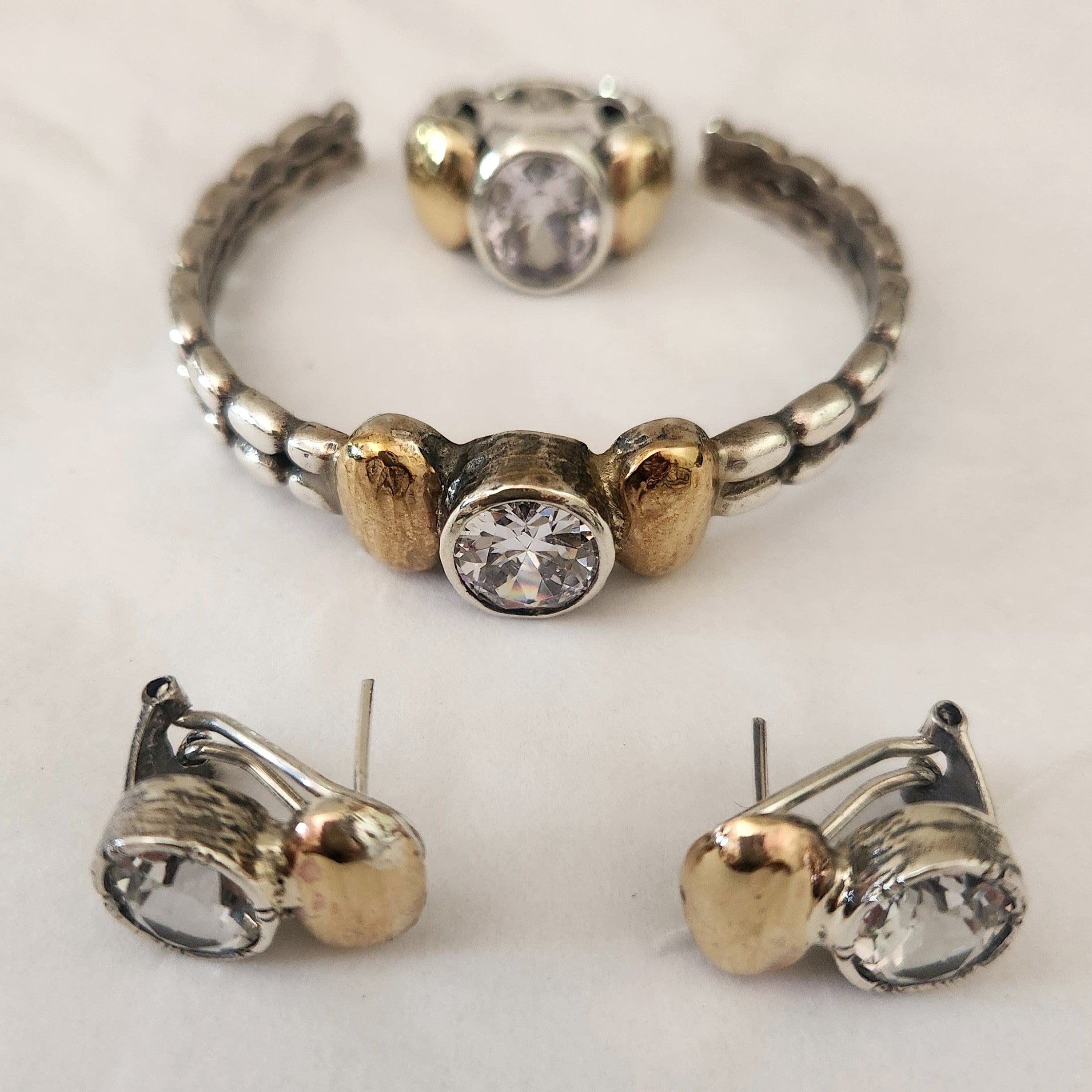 "Celeste" Sterling Silver Cuff with 9 ct gold and Zirconia Centre Stone.