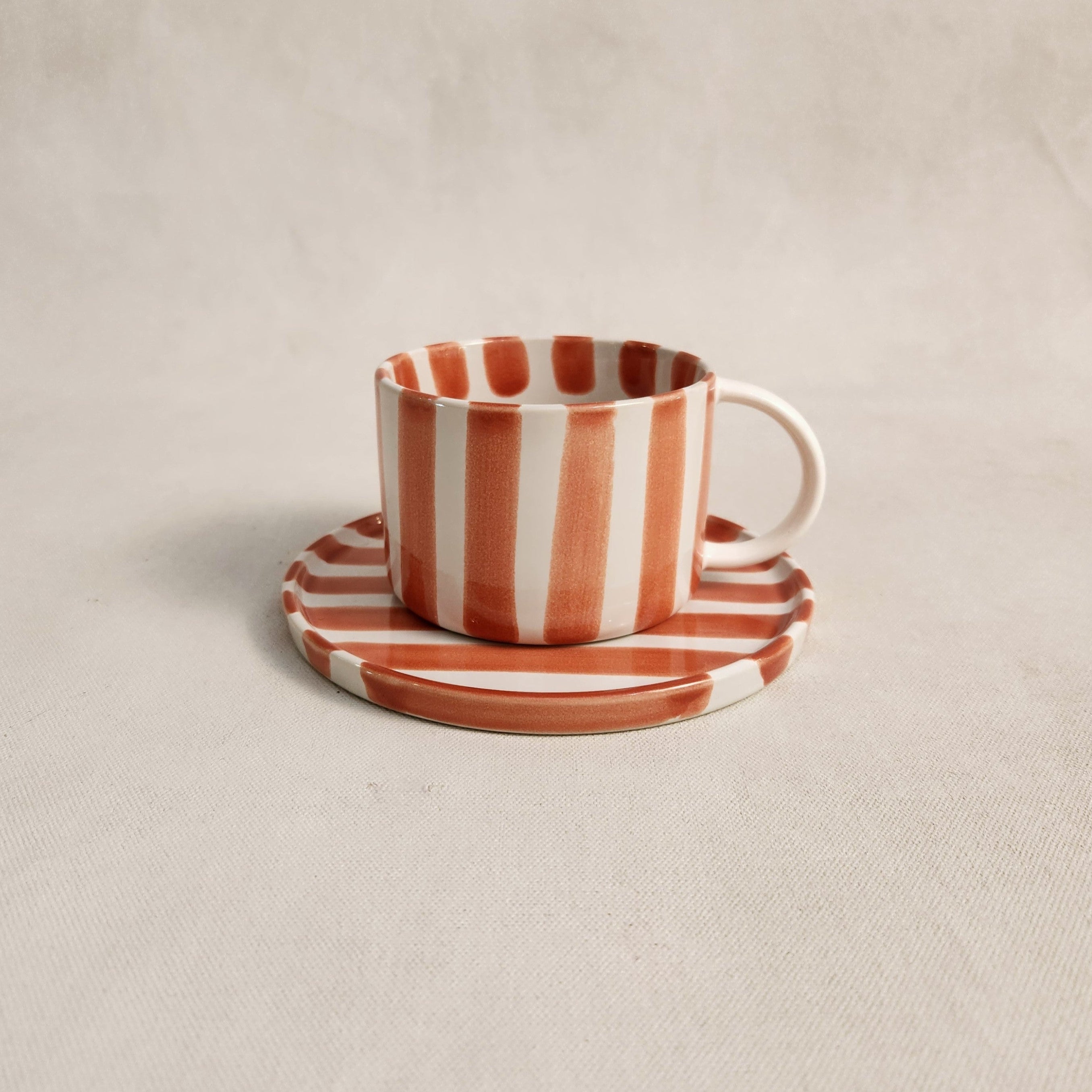 Monica Cup and Saucer – Rust