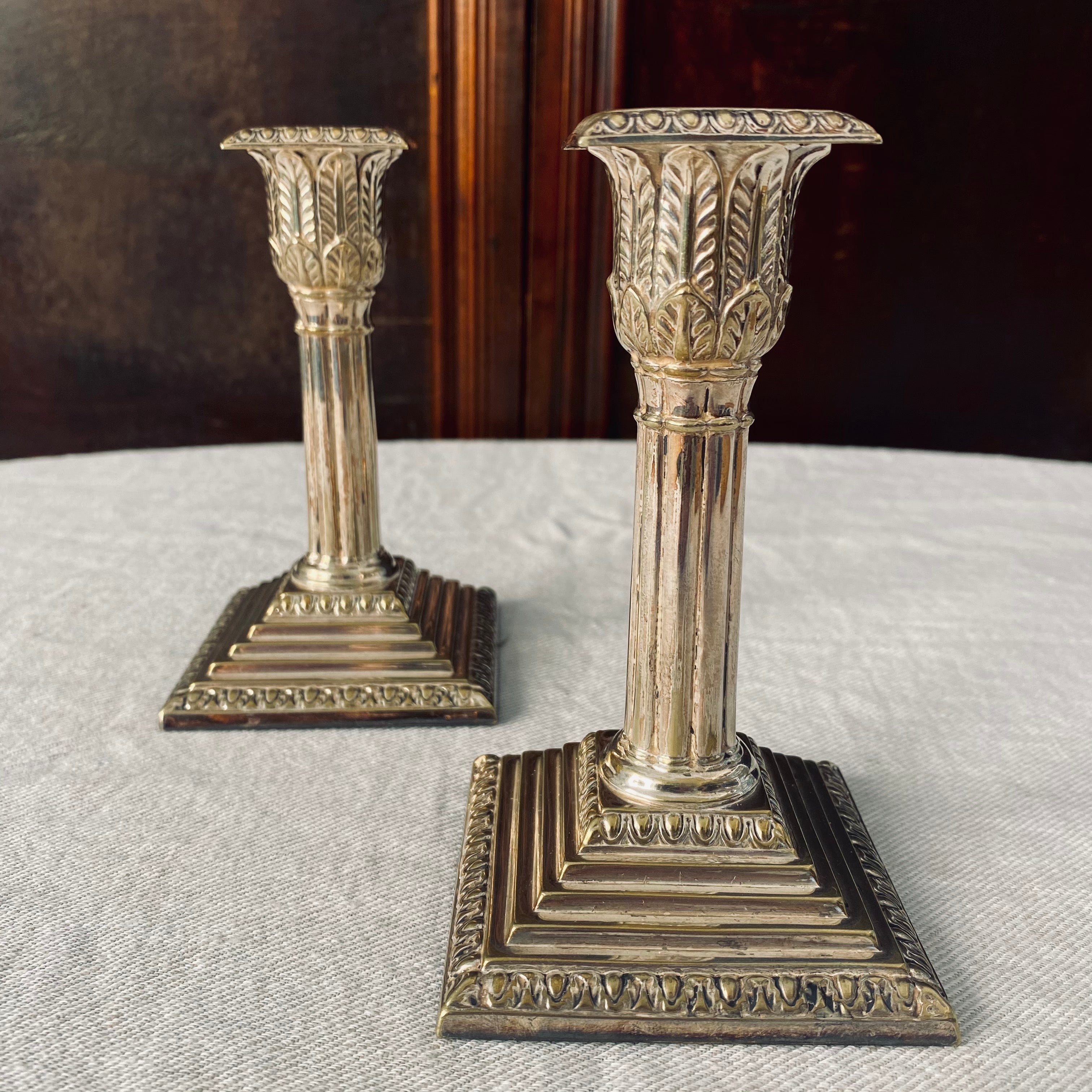 Pair of Silver Plated Corinthian Candlesticks