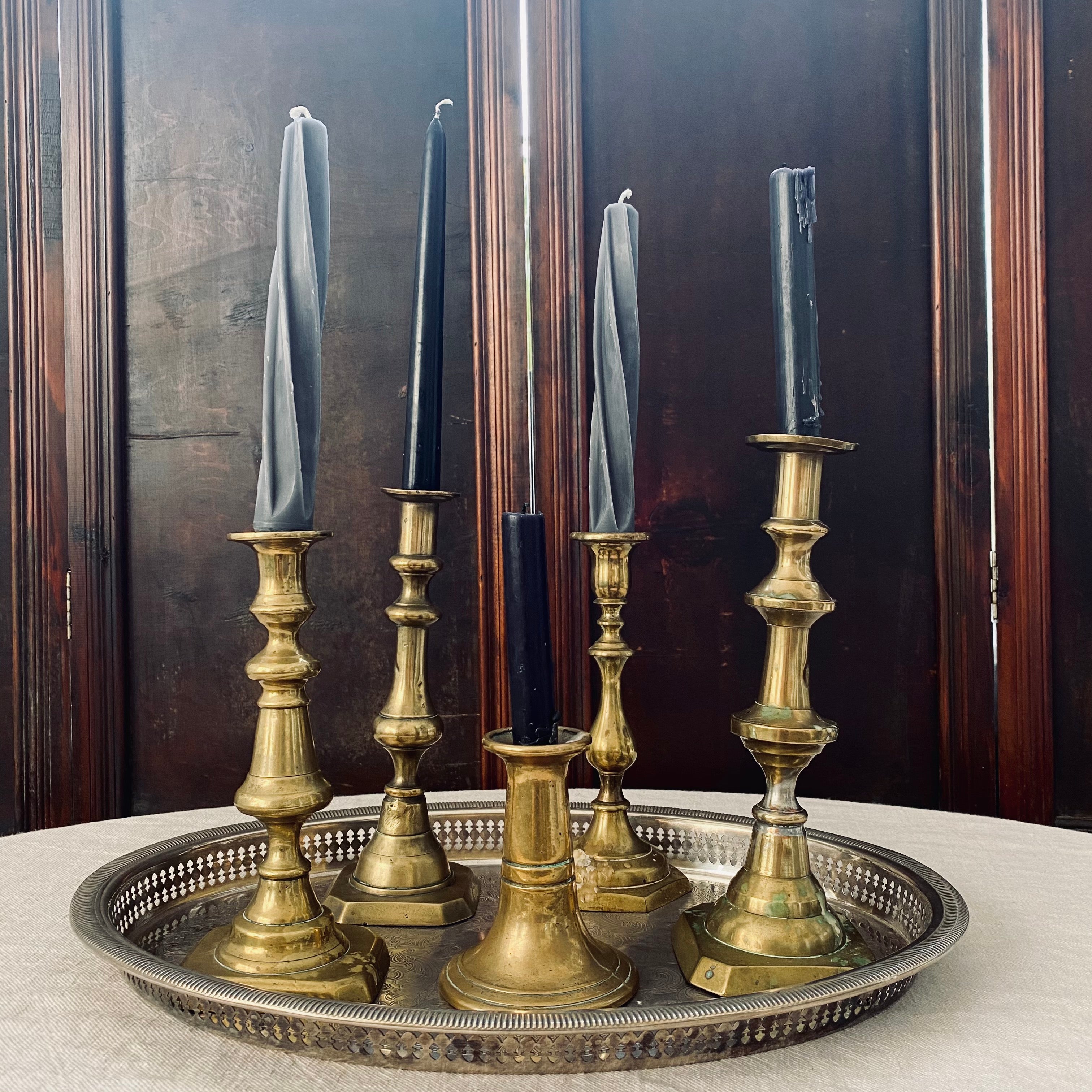 Trio of Antique Brass Candlesticks