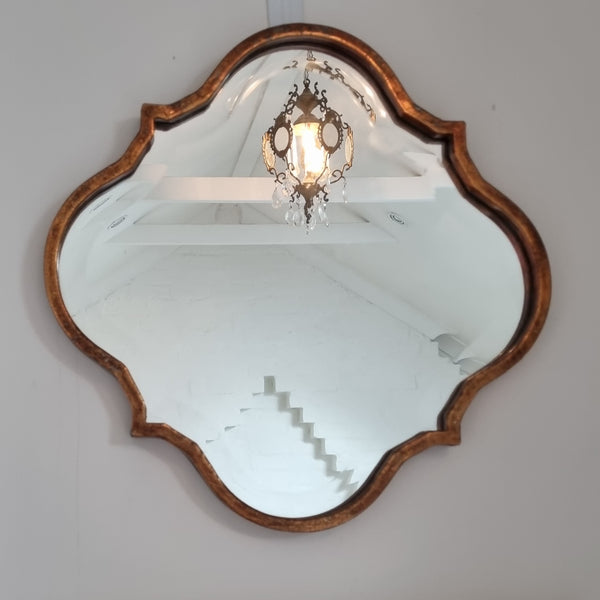 Middle Eastern style copper coloured mirror