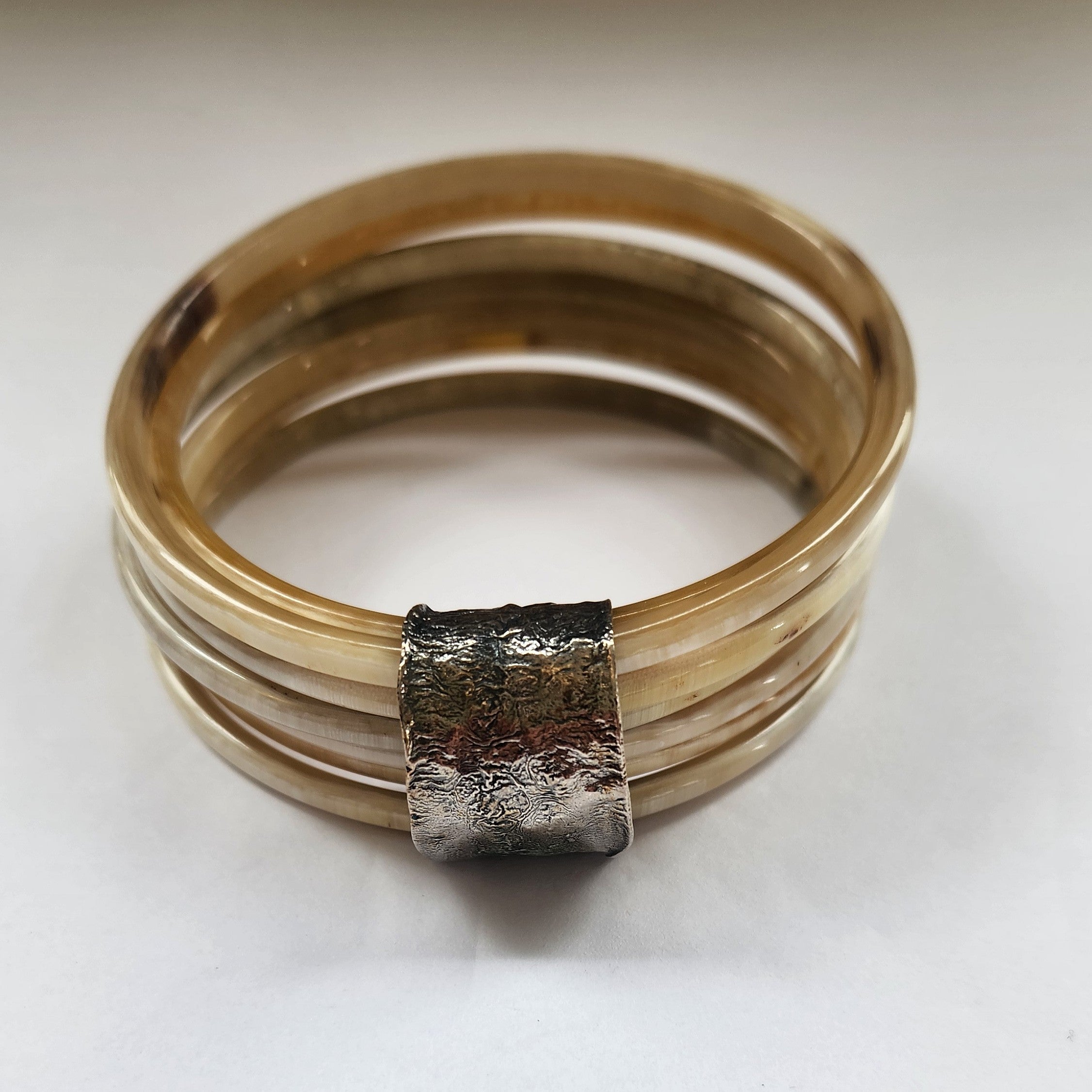 Natural buffalo bangle cluster with silver  plated detail