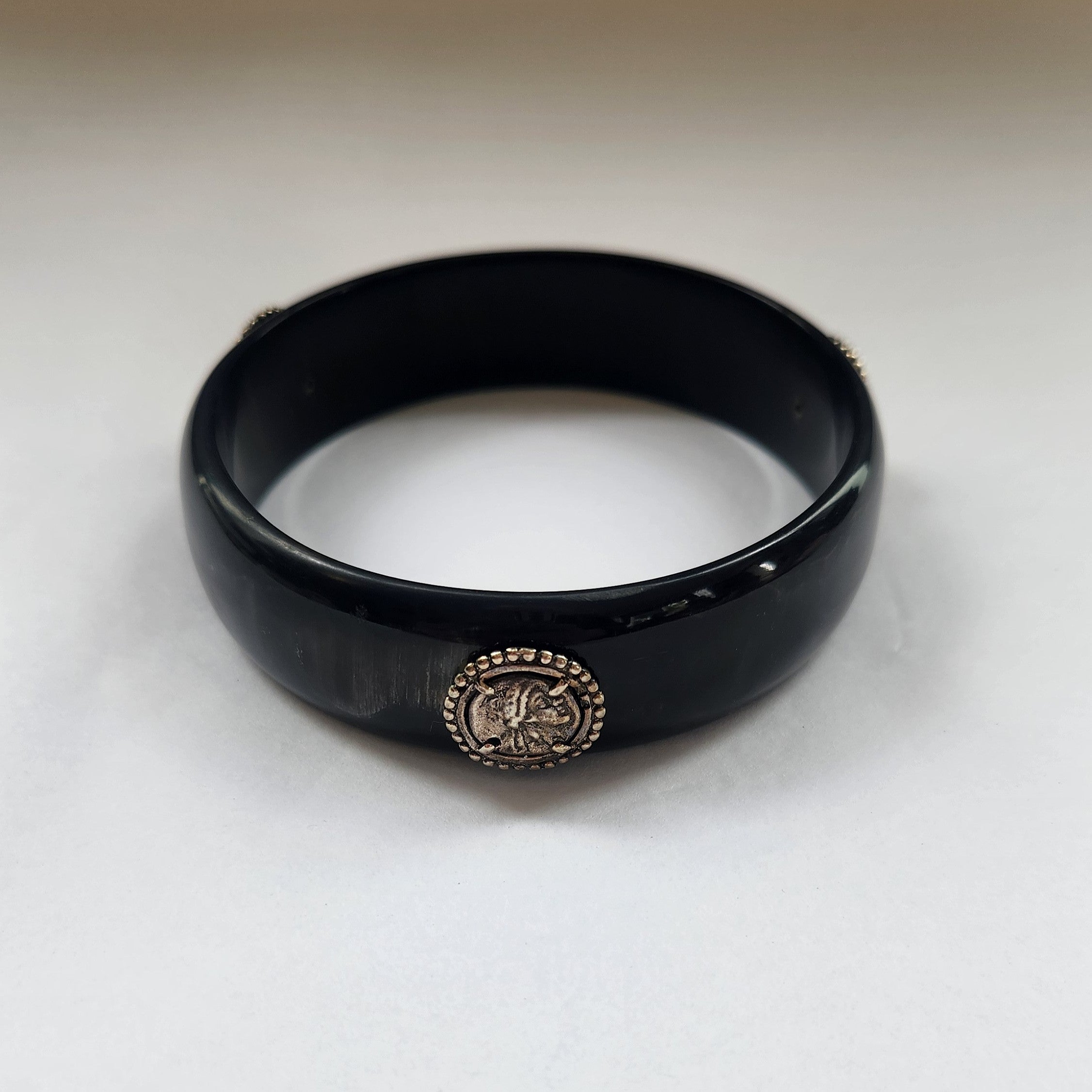 Black Horn bracelet with silver plated coins