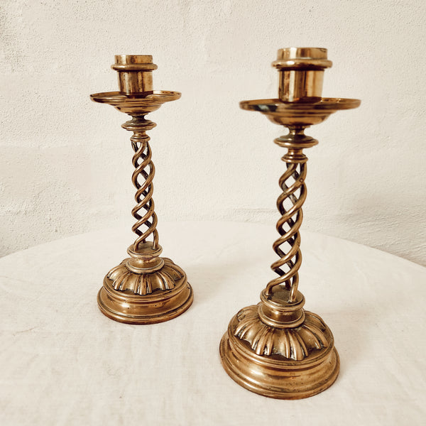 Pair of antique brass twist candlesticks