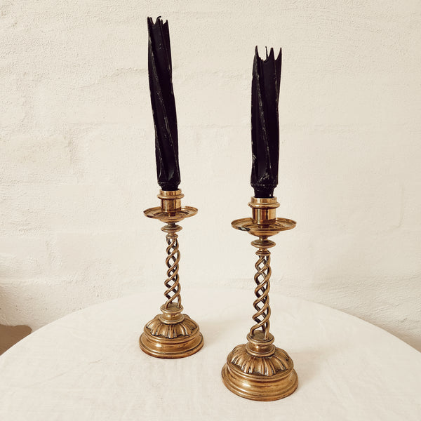 Pair of antique brass twist candlesticks