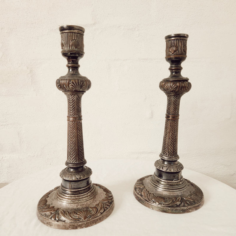 A pair of Silver on Copper, Shell and Palm Frond Candlesticks