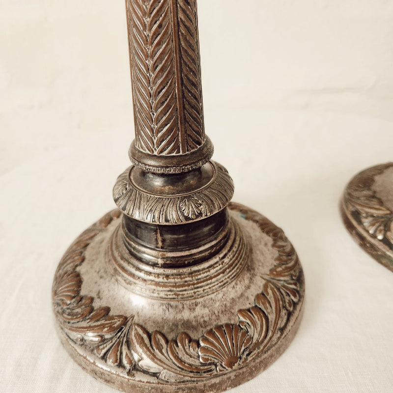 A pair of Silver on Copper, Shell and Palm Frond Candlesticks