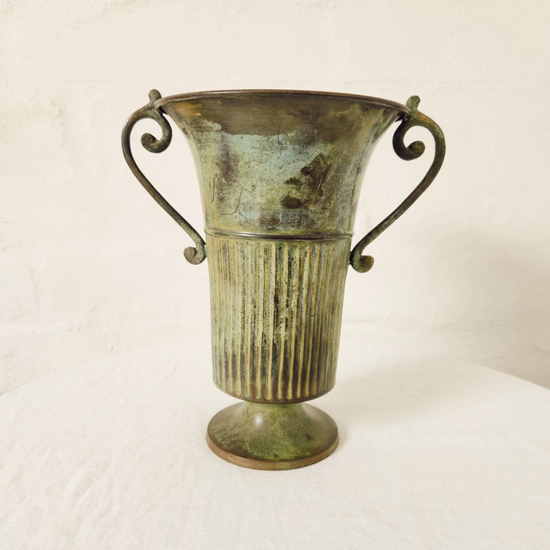 Verdigris finished fluted metal vase