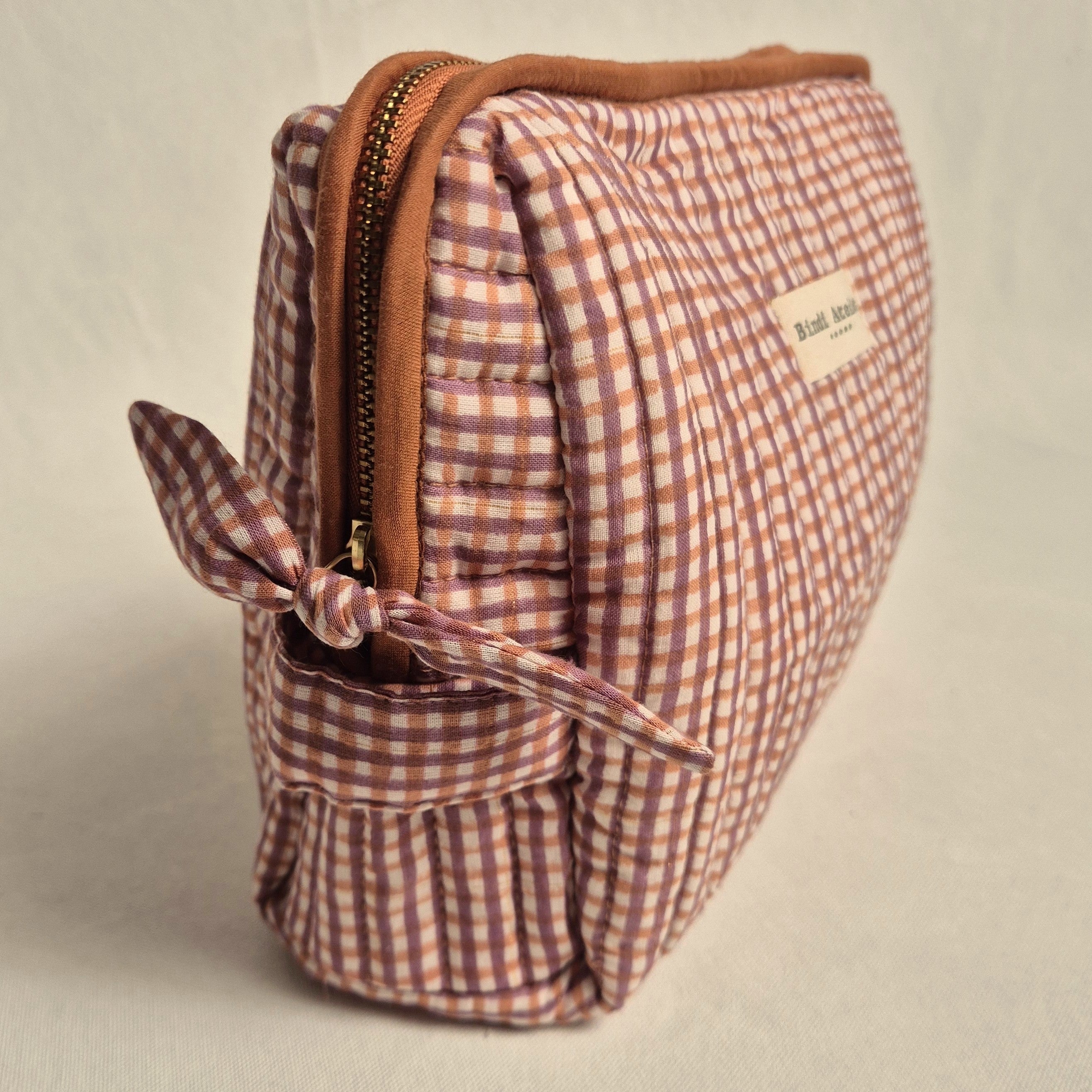 pink and caramel French gingham print toiletry bag