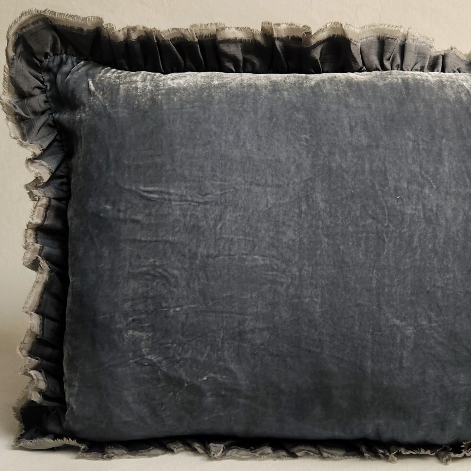 Smoky blue silk velvet rectangular cushion with raw silk ruffle