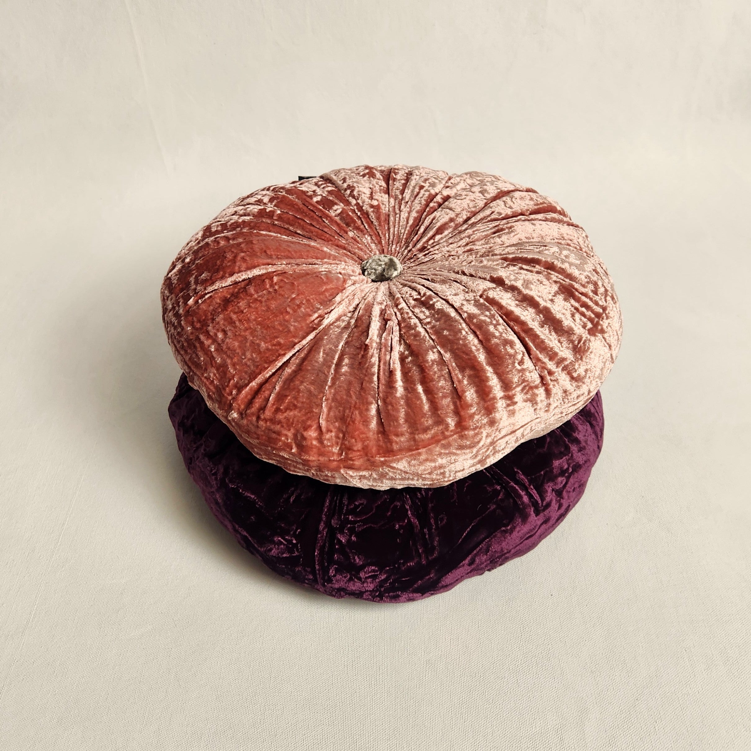 Round pink silk velvet cushion
