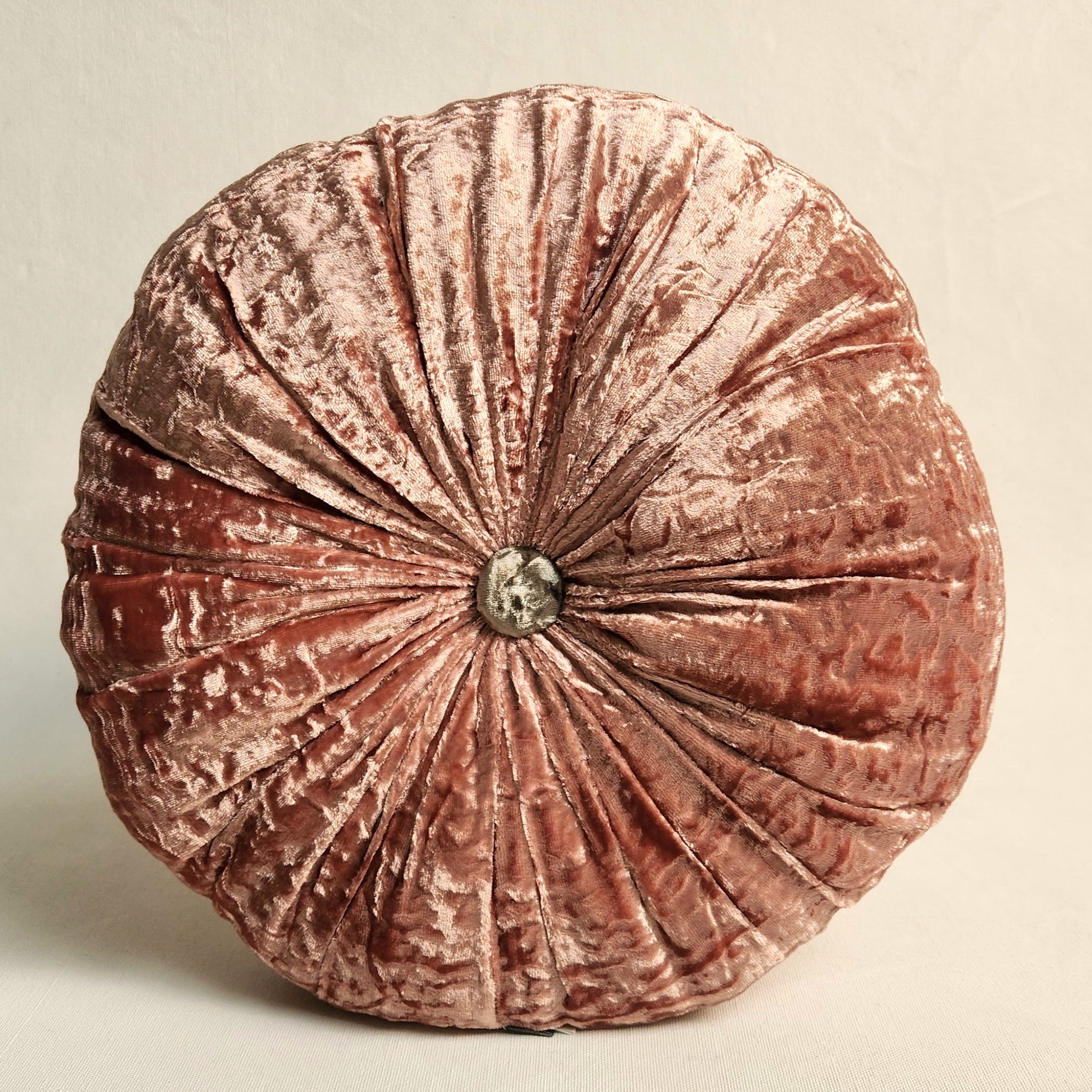 Round pink silk velvet cushion