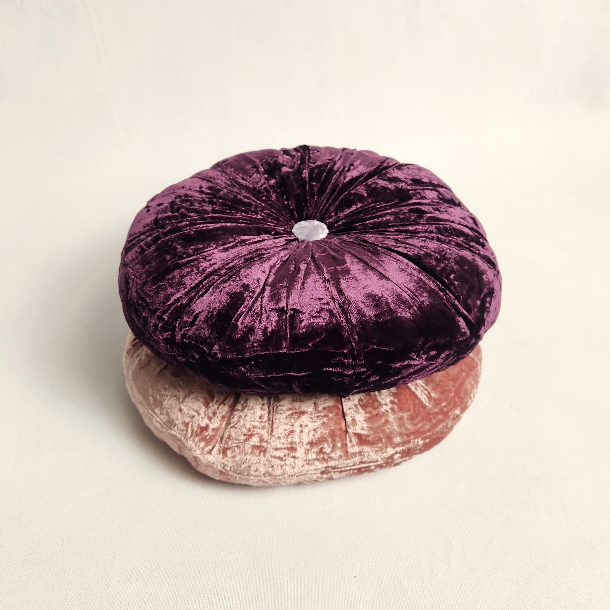 Round purple silk velvet cushion