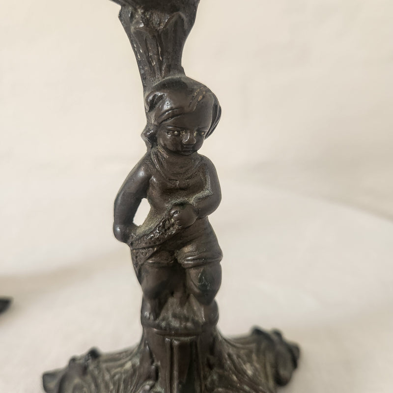 Pair of Cast Iron Metal Putto Candelabras