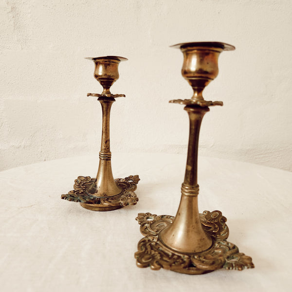 Pair of small brass antique decorative square based candlesticks