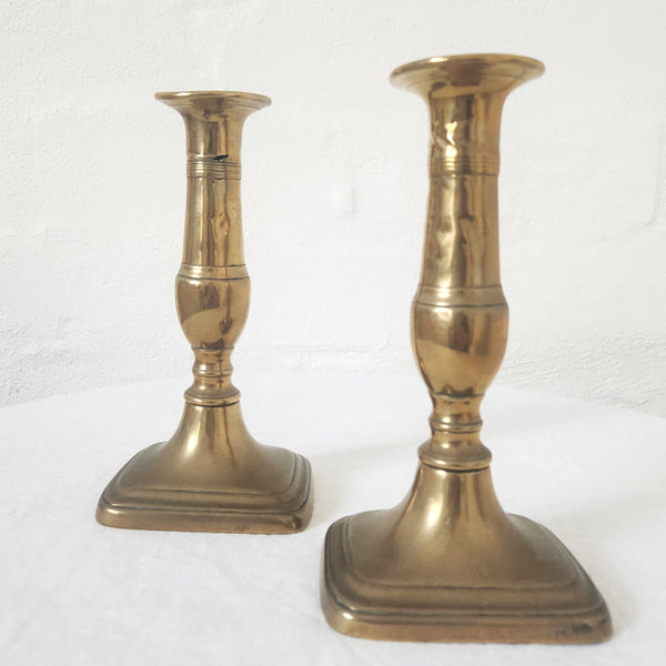 Antique Brass candlestick pair with oblong base