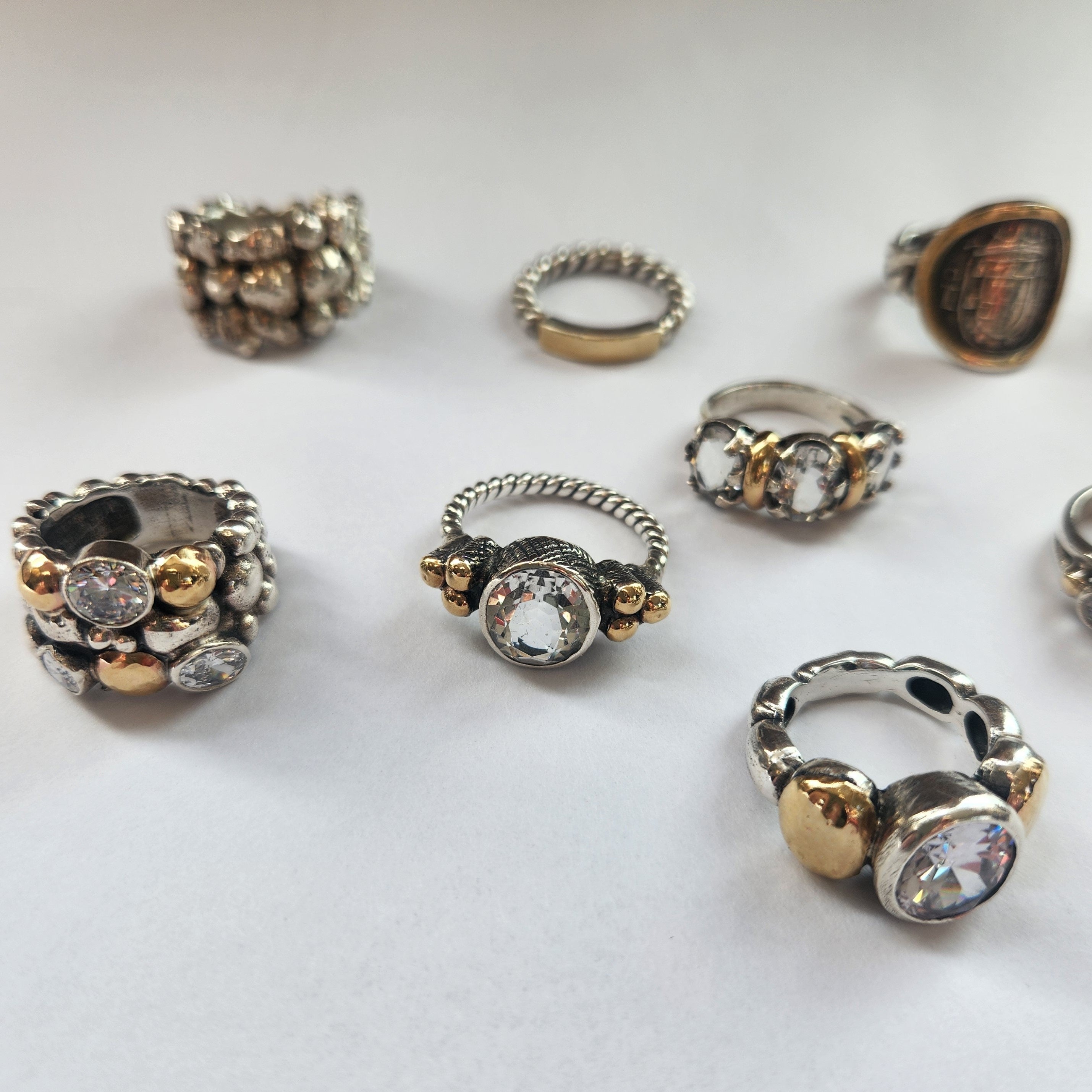 "Luciana" Plaited Silver Ring with Centre rock crystal and 9ct gold clusters.