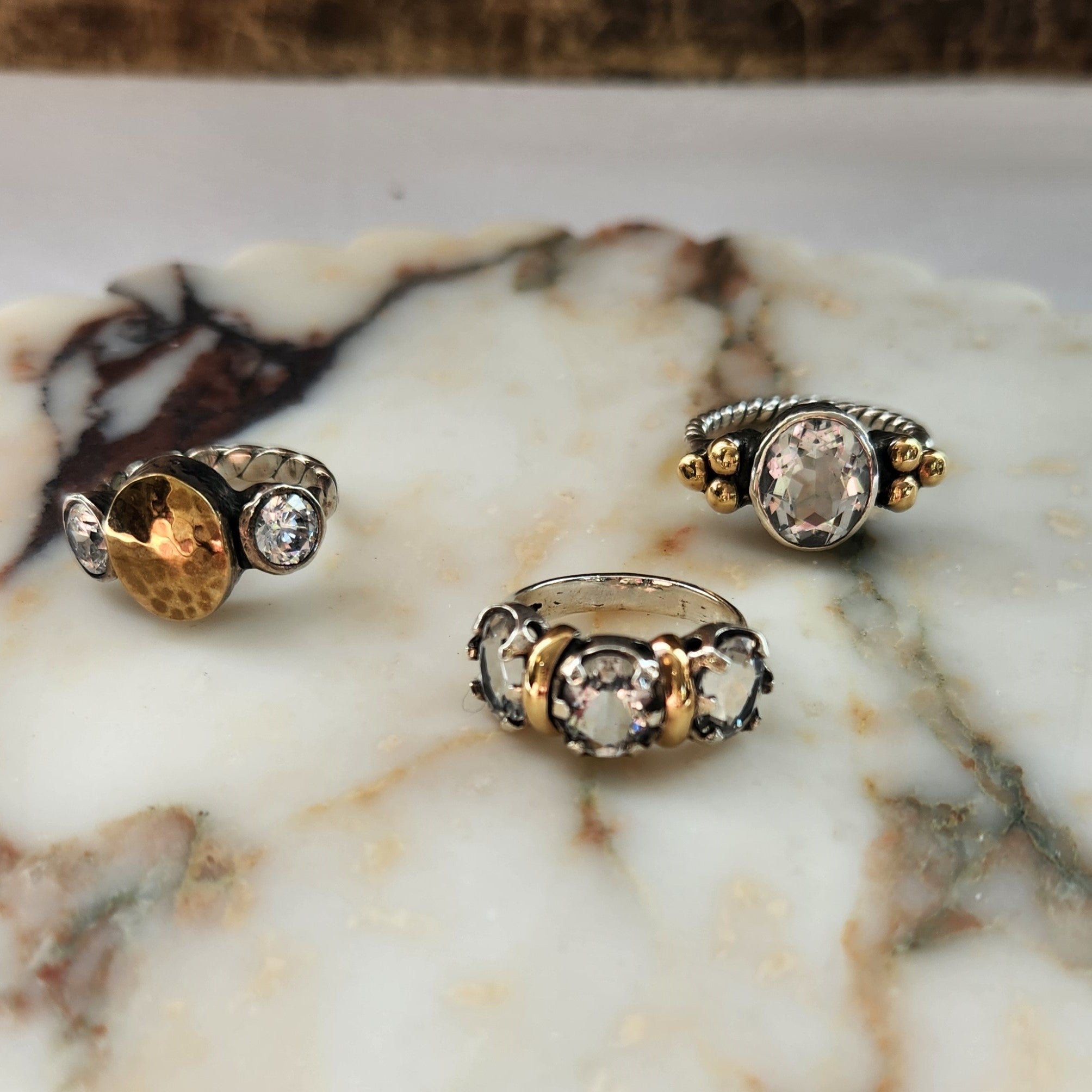 "Luciana" Plaited Silver Ring with Centre rock crystal and 9ct gold clusters.