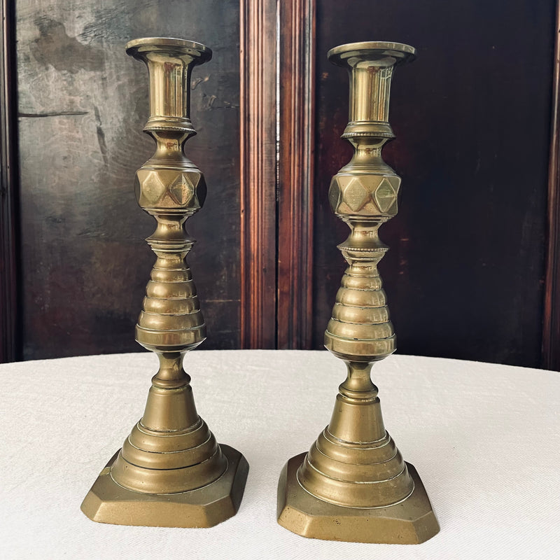 Pair of Antique Brass King of Diamond Candlesticks