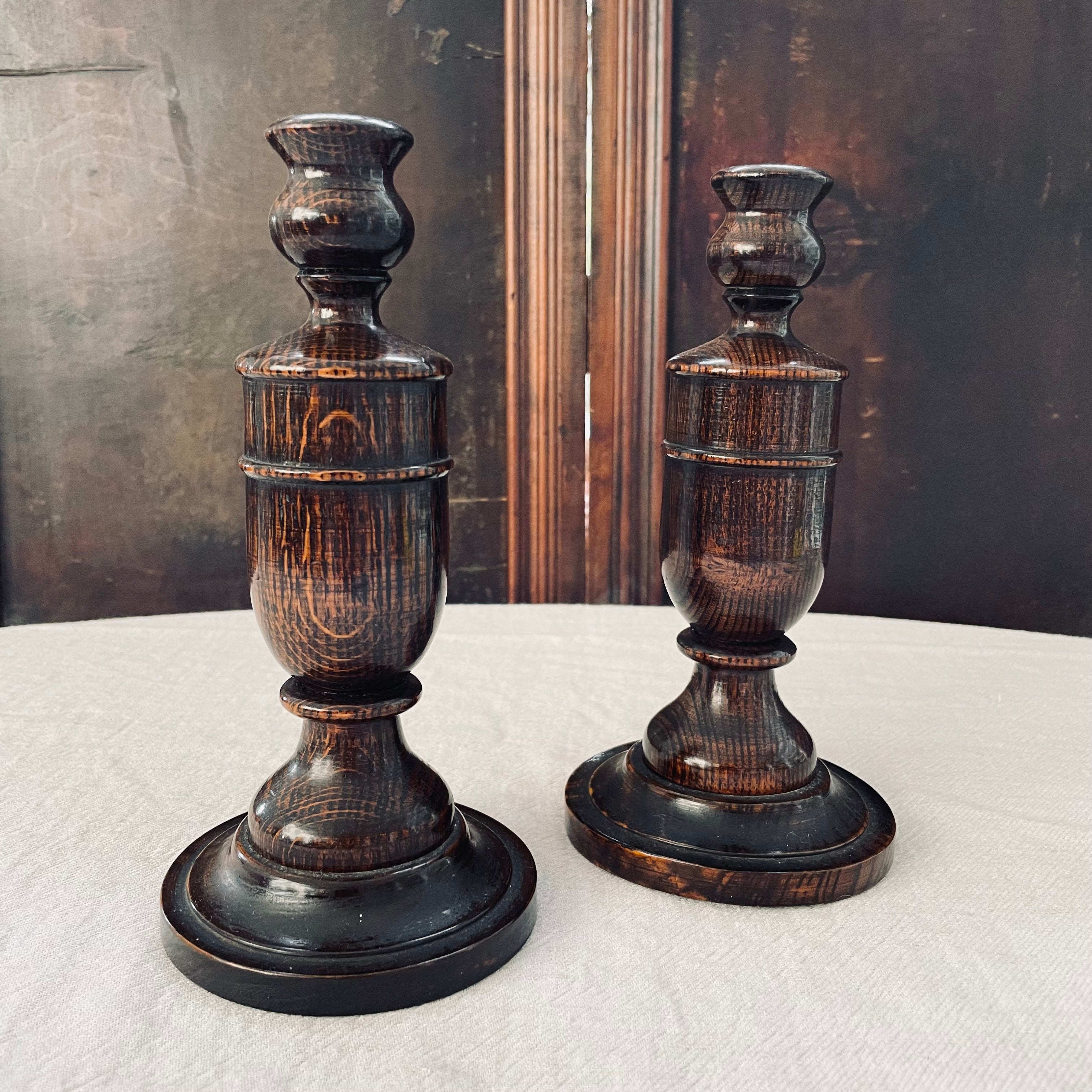 Pair of oak turned candlesticks