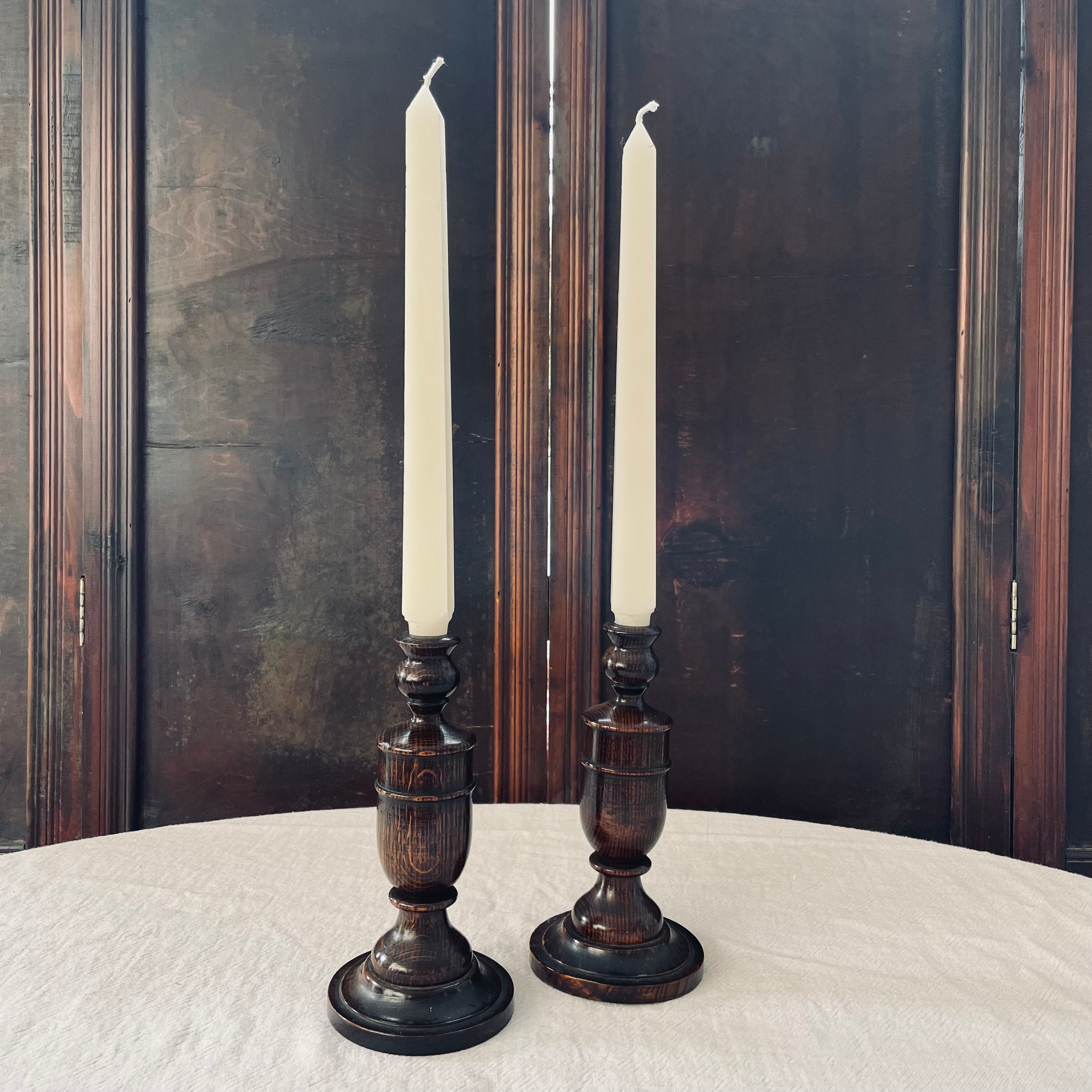Pair of oak turned candlesticks