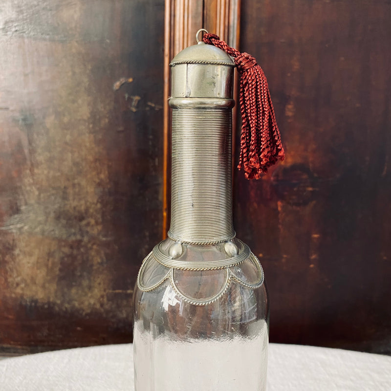 Wirework Mounted Glass Bottle with Burgundy Tassel